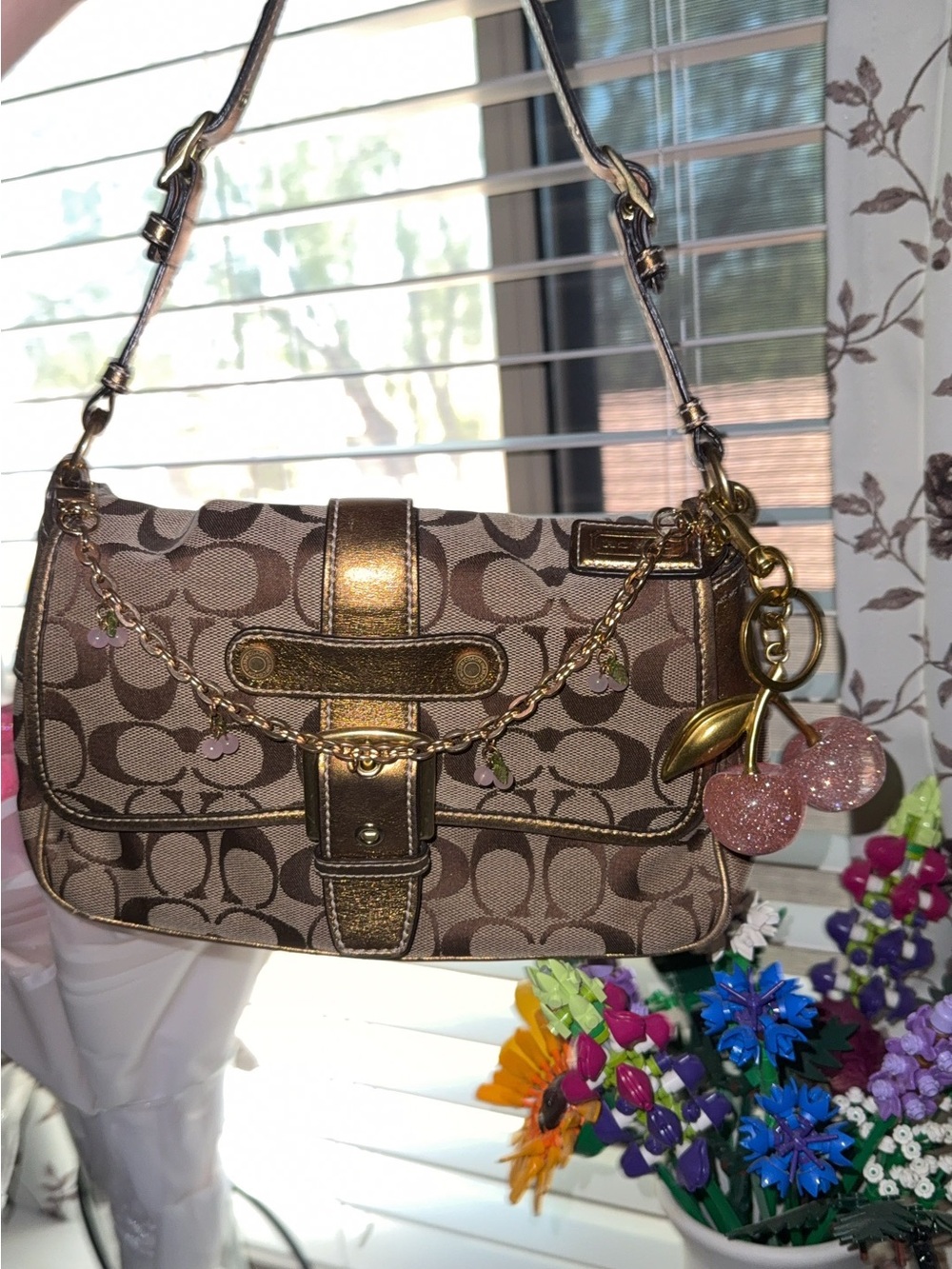 Vintage Coach bag with cherry charm